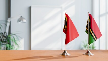 FLAGS OF EAST TIMOR AND VANUATU ON TABLE