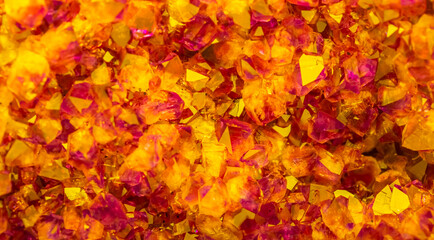 Multi-colored crystal mineral stone. Gems. Mineral crystals in the natural environment. Texture of precious and semiprecious stones. shiny surface of precious stone