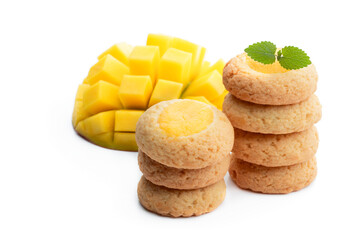 Homemade mini sugar cookies with mango jam isolated on white
