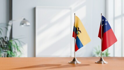 FLAGS OF ECUADOR AND SAMOA ON TABLE