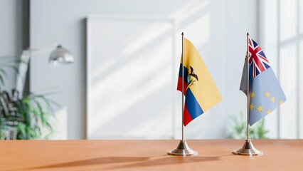 FLAGS OF ECUADOR AND TUVALU ON TABLE
