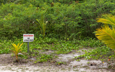 Warning sign: Private property. Not a public toilet