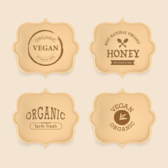 Set of Organic and Natural banner. Organic label wood texture. Disposable paper plates on kraft paper background. Eco friendly disposable tableware. Top view.