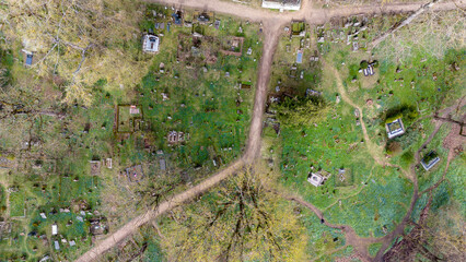 Aerial View of a Tranquil Cemetery with blue flowers © M