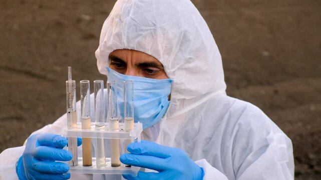 Taking soil samples in nature. Selective focus.