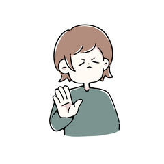 手を前に出して拒否している女性