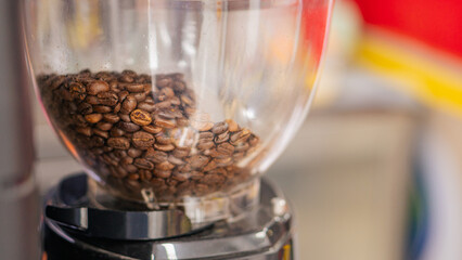 Close-Up of Coffee Grinder with Roasted Beans