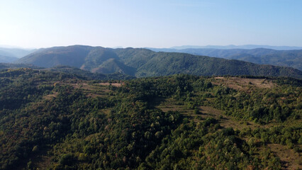 Aerial view on the top of the hill and forest.