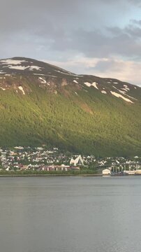 Arctic Cathedral, Troms&oslash; Municipality, Troms, Norway - Tromsdalen valley parish church as seen from the other side of the fjord