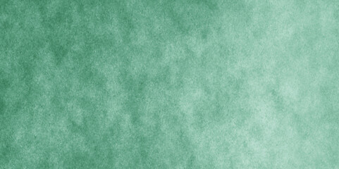 Abstract Elegant dark green background with mottled vintage texture in old fancy background design, texture of colored parchment paper.