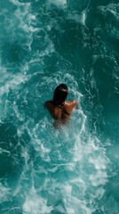 Woman Swimming in Turquoise Ocean Waters