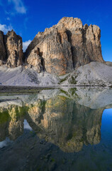 Scenic wide angle landscape of Lago d'Antermoia, a glacial lake in Antermoia valley, Dolomites, South Tyrol, Italy, Europe
