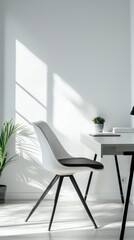 Modern chair in a bright workspace with natural light and minimal decor, ideal for contemporary office settings.
