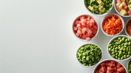 A selection of colorful poke bowls filled with fresh ingredients like diced tuna, avocado, and edamame sits neatly on a white surface, offering plenty of space for branding