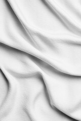 A close-up of smooth white fabric, beautifully showcasing its soft texture and elegant folds. Perfect for backgrounds or textile design.