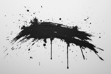 Abstract black paint splash creating a dramatic and artistic background, perfect for showcasing creativity and modern design.