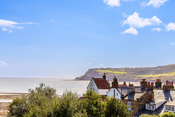 Scenic landscape of Robin Hood's Bay, a picturesque old fishing village on the Heritage Coast of the North York Moors in England.