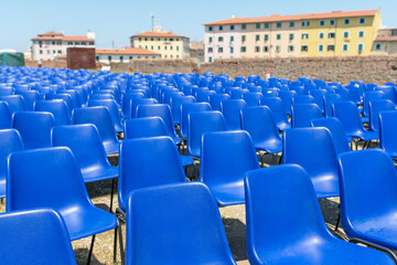 Naklejka premium Blue chairs. Livorno Music Festival. Western Coast of Tuscany