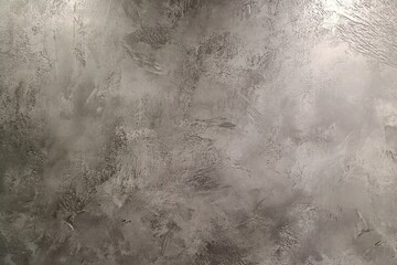 Fototapeta premium A close-up shot of a textured grey wall.