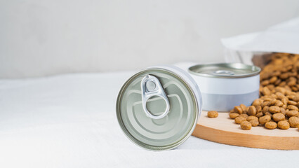 Close-up of Pet Food Can and Dry Food