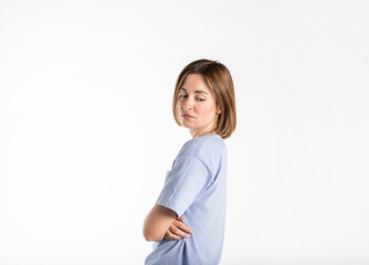 Close-up portrait of young scared woman isolated on white background	