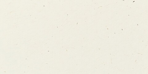 Close-up of a textured, off-white paper surface with subtle flecks of brown.