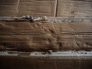 Old vintage paper with a glowing center and grunge vignette.