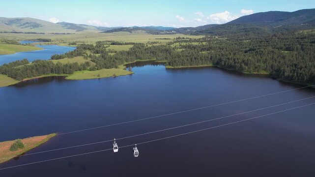 Flying Above Ribnicko Lake and Gold Gondola Lift Cabins, Landscape of Zlatibor Mountain, Serbia