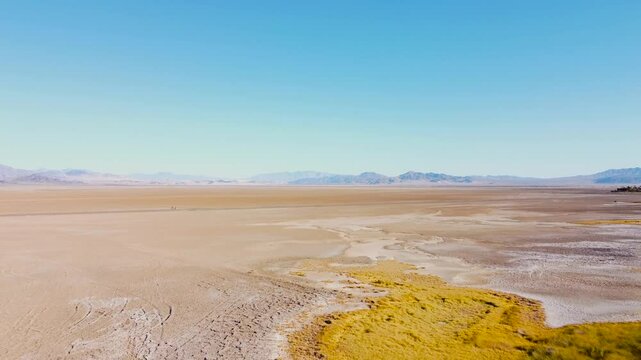 Nevada dry lake bed drone back across on a sunny summer day
