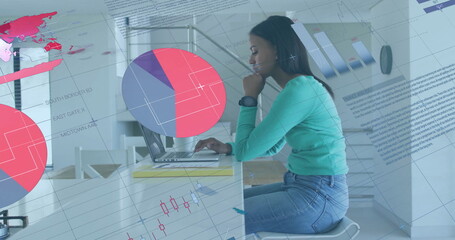 Image of financial data processing over biracial woman using laptop