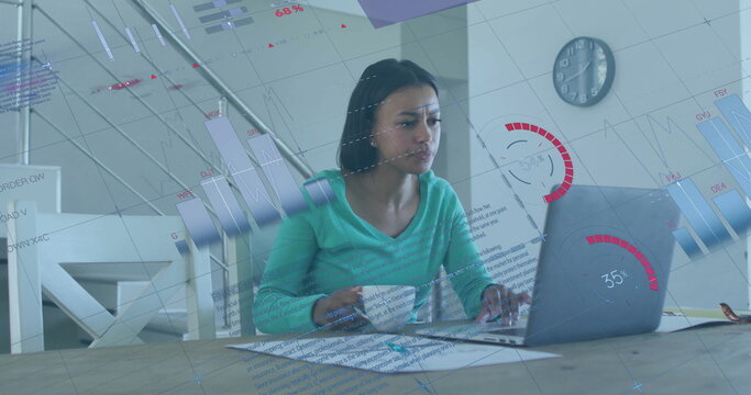 Image of financial data processing over biracial woman using laptop