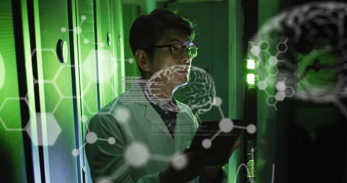 Image of data processing with brains over asian male scientist in server room