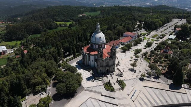 sweeping aerial rotation reveals the grand Santuario do Sameiro, nestled in Braga's hills