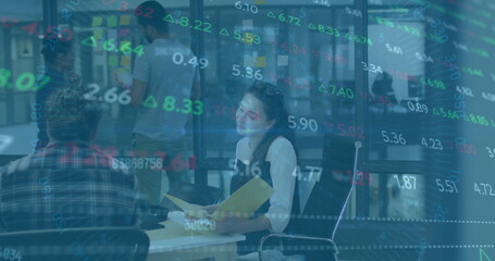 Image of financial data processing over diverse colleagues discussing work in office