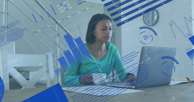 Image of financial data processing over biracial woman using laptop