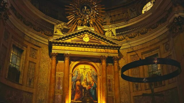 Step inside an ornate Church of the Gesu filled with beautiful artwork and warm, glowing light