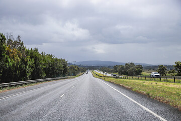Long Open Highway Stretching Across Peaceful Countryside