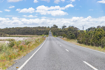 Long Open Highway Stretching Across Peaceful Countryside