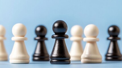 Black pawn leading white pieces on blue background