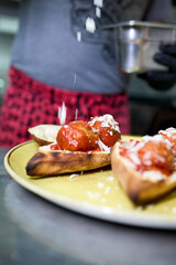 A hearty sandwich made with a pizza dough base, baked to perfection and filled with two perfectly assembled meatballs