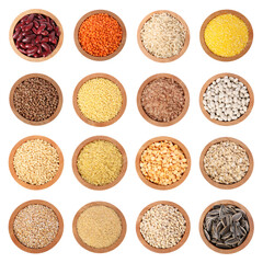 Different cereal grains, seeds and beans in bowls on white background, top view. Collection