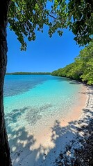 A serene beach scene with turquoise water, white sand, and lush green foliage creating a tranquil atmosphere.