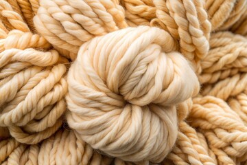 Detailed close-up of cream-colored yarn with soft texture