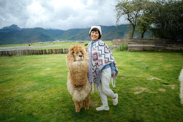 woman portrait, Thai woman tourists like photography, love to travel, Travel on trip in holiday Zhongdian County, northwestern Yunnan China. © padarn