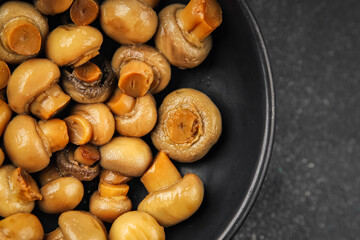 Champignon mushroom canned product tasty food dish fresh delicious gourmet food background on the table rustic food top view copy space top view keto and paleo diet Vegetarian and vegan food