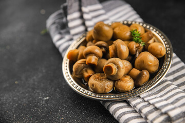Champignon mushroom canned product tasty food dish fresh delicious gourmet food background on the table rustic food top view copy space top view keto and paleo diet Vegetarian and vegan food