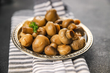 Champignon mushroom canned product tasty food dish fresh delicious gourmet food background on the table rustic food top view copy space top view keto and paleo diet Vegetarian and vegan food