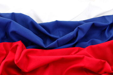 White, blue and red fabrics form the flag of Russia