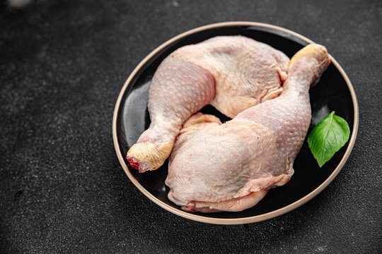 raw chicken legs meat chicken thighs poultry flesh on the bone gourmet fresh meal food snack on the table copy space food background rustic top view