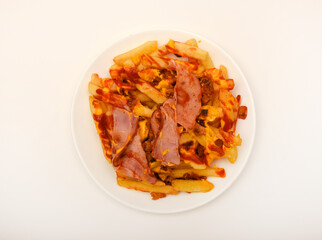 A delicious snack of ham and potatoes on a white plate.